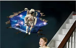 3D space astronaut wall sticker showing a realistic broken wall effect in a home interior