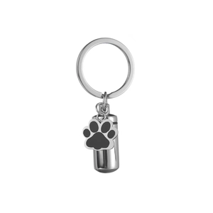 Polished stainless steel pet cremation keychain with urn capsule and paw print charm