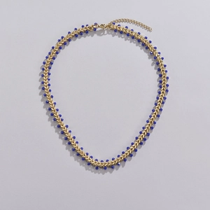 14K gold plated stainless steel necklace featuring elegant blue faceted beads and mesh chain