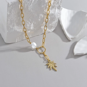 Collana vintage francese in acciaio al titanio con ciondolo a foglia e grande perla bianca