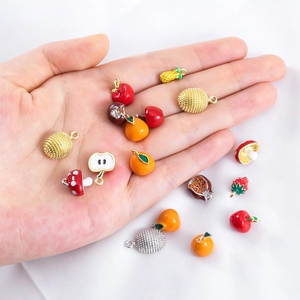 Pastel alloy fruit and mushroom pendants for DIY necklace jewelry in palm-size view