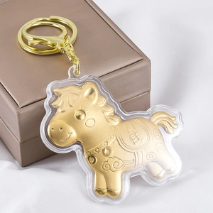 Porte-clés cheval doré avec texte porte-bonheur sous étui acrylique et fermoir or