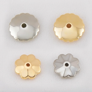 Golden and silver flower spacer beads and disc ear nut findings for jewelry making