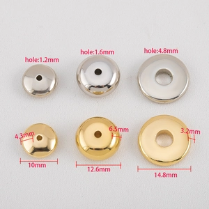 Flache runde CCB-Radperlen in Gold und Silber mit Größenangaben von 10 mm bis 14,8 mm