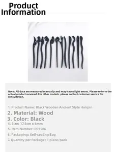 Detail view of carved black wood hair stick showing traditional patterns and 17.5cm length