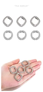Macro detail of geometric hollow CCB plastic silver beads for DIY jewelry making