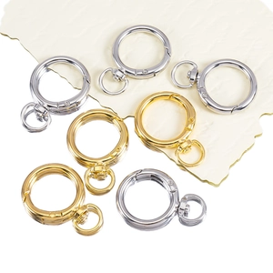 Polished zinc alloy spring gate rings with swivel snap hooks in gold and silver colors
