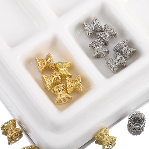 Hohle Schleifen-Zwischenperlen in Gold und Silber für die DIY-Schmuckherstellung