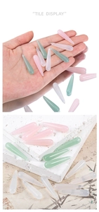 Detailed view of water-drop resin beads in pink and green for DIY hairpins and jewelry