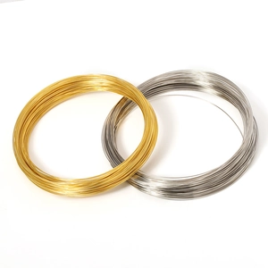 Golden and silver memory wire coils for DIY jewelry making and bracelet components