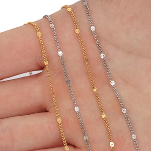 Minimalist 18k gold plated stainless steel O-chain necklaces with sequins held in hand