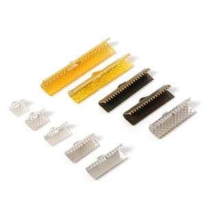 Assorted ribbon crimp ends in gold, silver, and bronze for DIY jewelry making