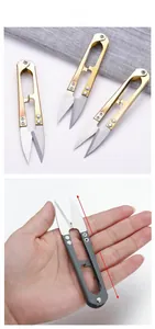 Close-up of 10cm U-shaped stainless steel thread snips with colorful metal handles