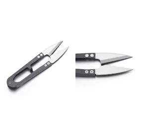 Detail view showing black matte U-shaped sewing scissors and close-up of sharp metal blades