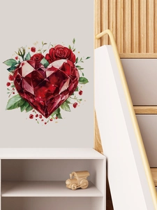 Detailed wall sticker view featuring a faceted red heart gem and blooming roses on a wall