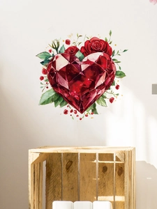 Detail of red heart diamond wall sticker with romantic roses and green leaves on wall