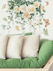 Detailed wall sticker view featuring watercolor white roses and colorful butterflies on a wall