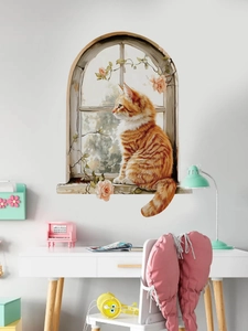 Detail showing a 3D cat wall sticker with a ginger cat on a window sill with pink roses