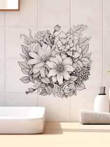 Détail de stickers muraux floraux noirs sur carrelage blanc dans une salle de bain moderne
