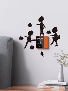 Close-up of black ballet dancer silhouette wall stickers near a smart control panel
