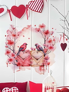 Close-up of pink birds and heart envelopes watercolor wall stickers on a wood wall