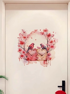 Detail of pink birds and cherry blossoms wall sticker on a white door for Valentine decor