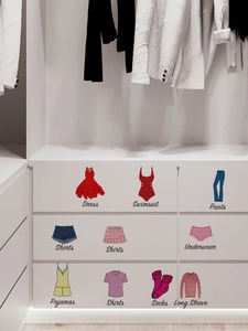 Detail of 10 colorful clothing icons and labels on white drawers for closet organization