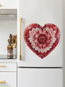 Detail of red mandala heart fridge magnet on white refrigerator in cozy kitchen
