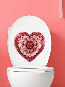Detail of a red watercolor heart floral wall sticker applied on a white surface background