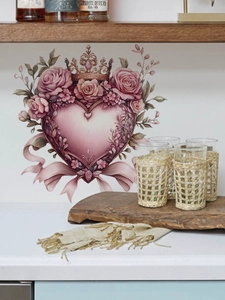 Detail of pink heart wall sticker with crown and roses in a cozy home setting