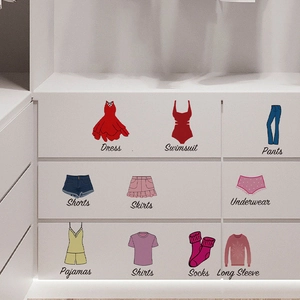 Set of 10 colorful hand-drawn wardrobe organization stickers on a white drawer cabinet