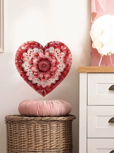 Detail of red heart mandala wall decal showing watercolor floral textures in a bedroom