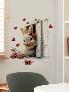 Detail of cute brown rabbit wall sticker peeking from a wooden window with red hearts