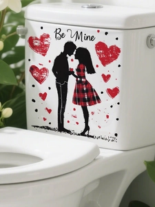 Macro detail of Be Mine Valentine couple wall sticker on a white ceramic surface