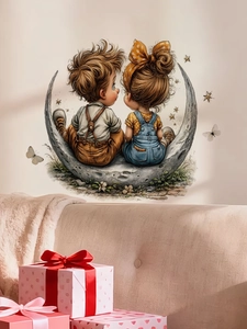 Detail view of cartoon boy and girl on moon wall sticker above a beige sofa with gift boxes