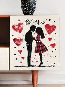 Detail of Valentine's couple silhouette wall sticker with red hearts on wooden cabinet