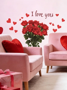 Detail of red rose and heart wall decals with I Love You lettering on a bedroom wall