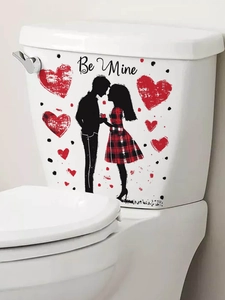Romantic 'Be Mine' heart decal with couple silhouette applied to a white toilet tank