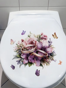 Detail of purple floral wall sticker featuring golden rings and butterflies for bathroom