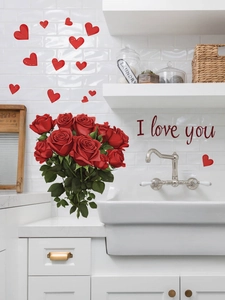Macro detail of red rose wall stickers and heart decals on white tile bathroom wall