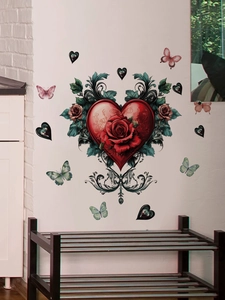 Detailed view of red rose and heart wall decals set applied on a clean white living room wall
