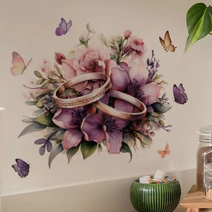 Elegant wall sticker with golden rings, purple flowers, and butterflies for home decor