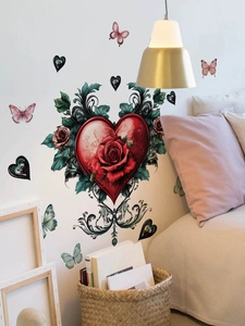 Detail of red heart rose wall stickers with green scroll patterns and pink butterflies