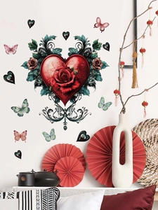 Detail of red rose heart wall sticker with butterflies in a decorative room setting