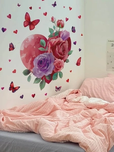 Bedroom wall decor detail showing red heart and colorful roses PVC self-adhesive stickers