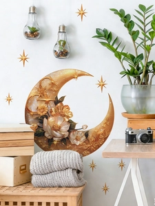 Vue détaillée des stickers muraux lune dorée et fleurs dans un décor de chambre douillet