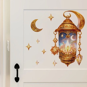 Golden Ramadan star lanterns and moon wall decals on white wooden door background