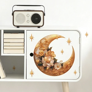Stickers muraux lune fleurie dorée sur meuble blanc pour déco chambre et salon cosy