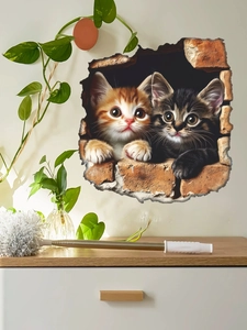 Detailed view of 3D cat wall stickers showing two kittens peeking through a broken brick wall