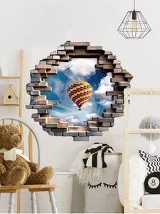 Détail de l'autocollant mural 3D montgolfière effet mur brisé dans une chambre